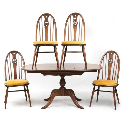 Ercol elm extending dining table and four chairs with swan c...