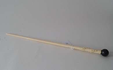 European ivory staff (probably part of an umbrella), decorated with musical instruments, knob of later date