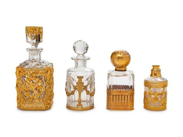 Four French Gilt Bronze Mounted Glass Bottles