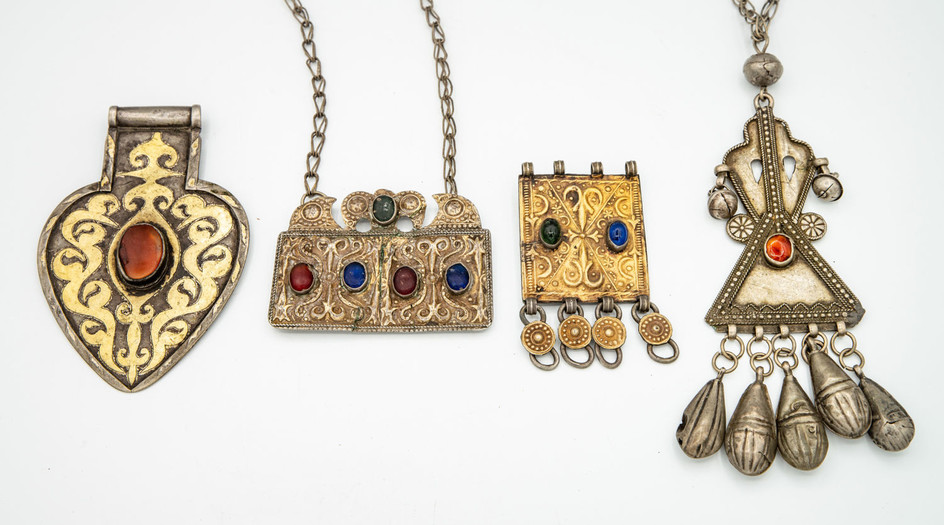 Four Silver and Silver Gilt Dress Ornaments, Uzbekistan, Early 20th Century