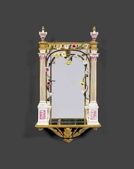 GILT BRONZE MIRROR IN THE LOUIS XVI STYLE WITH PORCELAIN INSERTS