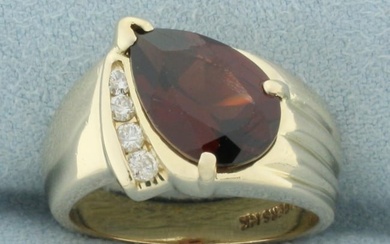 Garnet and Diamond Ring in 14k Yellow Gold