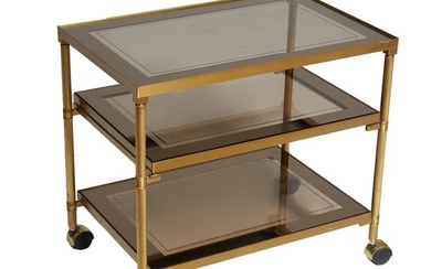 Mid Century Brass and Glass Bar Cart, 20th c., with three glass shelves, the medial shelf slides