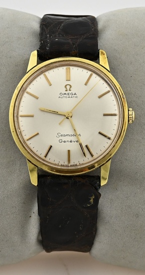 Omega seamaster, montre vintage, plaquée or, automatique, équipée d'un bracelet en cuir, un peu usée....