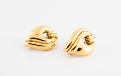 Pair of ear clips in 750 °/°° gold with flamed...