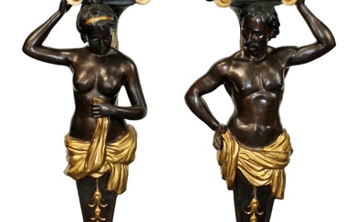Pair of figural pedestals in patinated bronze