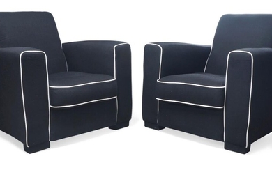 Possibly by Jacques Adnet, a pair of Art Deco armchairs, circa 1940/50, black upholstery with white piping, each 82cm high, 82cm wide