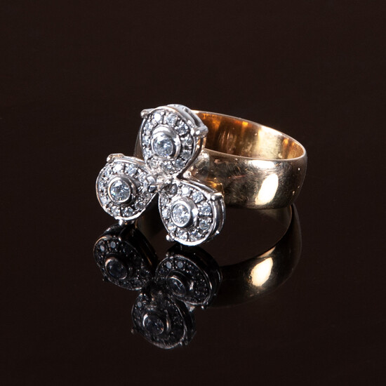 RING. Red and white gold with 33 set diamonds.