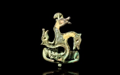 ROMAN BRONZE SWASTIKA BROOCH WITH HORSE HEADS