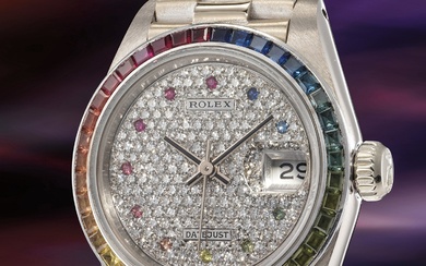 Rolex, Ref. 69119 An extremely rare and attractive white gold and multi-gem set calendar wristwatch with center seconds and bracelet