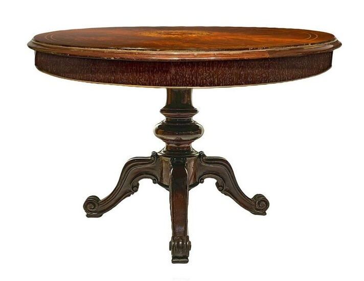 Round table with four-spoke central foot in solid