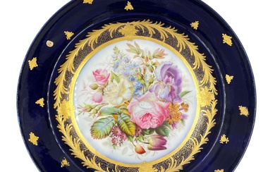 STILL LIFE ON A FRENCH PORCELAIN CHARGER A stunning...