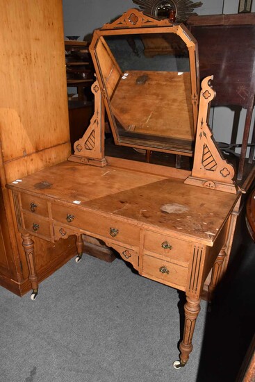 A Victorian Aesthetic movement pine and ebonised dressing table,...