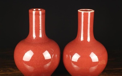Two Vintage of Chinese Sang de Boeuf Vases with crackle glaze bases, 13¼'' (34 cm) high.