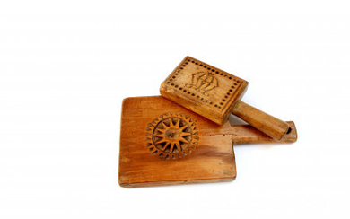 Two wooden butter stamp. Defects