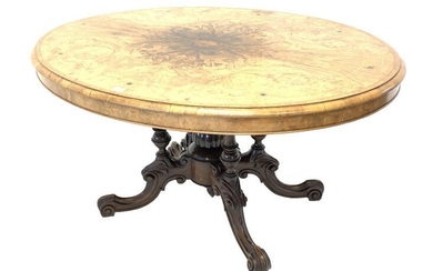 Victorian inlaid walnut oval loo table, the quarter sawn...