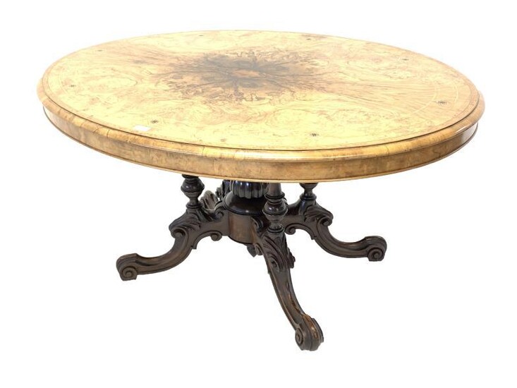 Victorian inlaid walnut oval loo table, the quarter sawn...