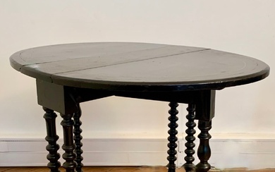 XXe SIECLE Table basse ronde à plateau en pietra dura à décor d'une guirlande de...