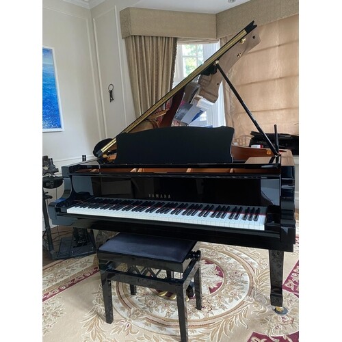 Yamaha (c2009) A 6ft 11in Model C6 grand piano in a bright e...