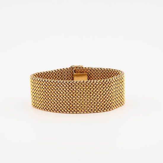 Yellow gold (585) ribbon bracelet with braided mesh....