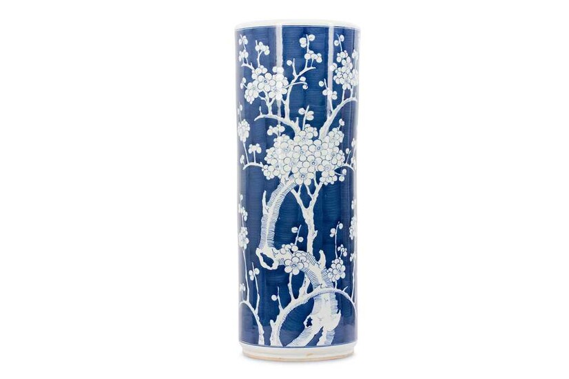 A CHINESE BLUE AND WHITE 'PRUNUS' UMBRELLA STAND. 20th...