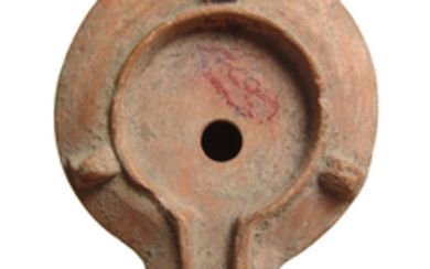 A Roman ceramic discus lamp with SEXTI mark