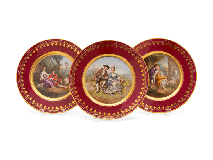 A Set of Twelve Royal Vienna Painted and Gilt Plates