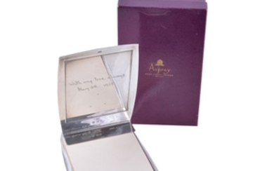 Asprey, a silver curved rectangular desk notepad by Asprey & Co. Ltd