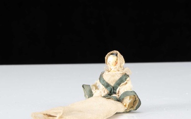 A 19th century Grodnerthal dolls’ house baby doll
