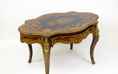 A 19thC kingwood centre table with a marquetry inlaid top ha...