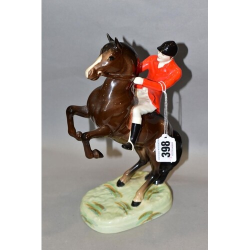 A BESWICK HUNTSMAN (ON REARING HORSE), No 868, style one, se...
