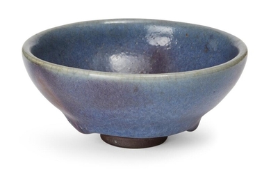 A Chinese Jun-type 'bubble' bowl, late Qing Dynasty/Republic, the dark stoneware body covered in a thick, sky blue glaze with five copper splashes, 12cm diam. 清晚期/民國 仿鈞釉盌
