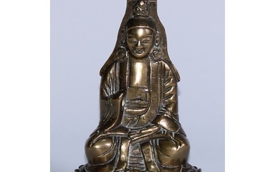 A Chinese bronze Buddha, seated in meditation, upon a lotus,...