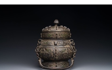 A Chinese bronze ritual wine vessel and cover, 'you', Yuan/M...