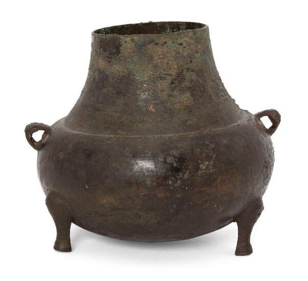 A Chinese bronze tripod vessel, Yuan dynasty, of bellied form...
