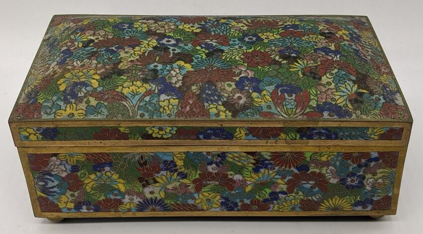 A Chinese enamelled jewellery box, raised on four bun