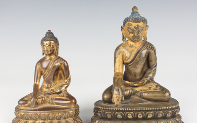 A Chinese gilt and blue patinated bronze Buddha, early 20th century, modelled seated in dhyanasana o