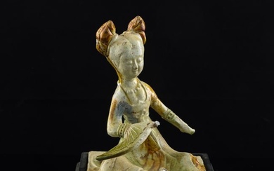 A Chinese sancai-glazed court lady figure, Tang dynasty