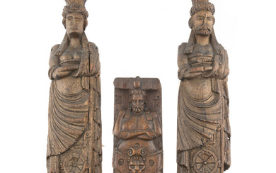 A Group of Three Carved Oak Figural Pilasters