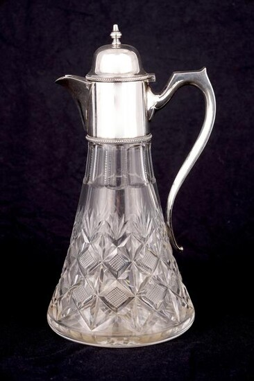 A LATE 20TH CENTURY CUT GLASS SILVER CLARET JUG of