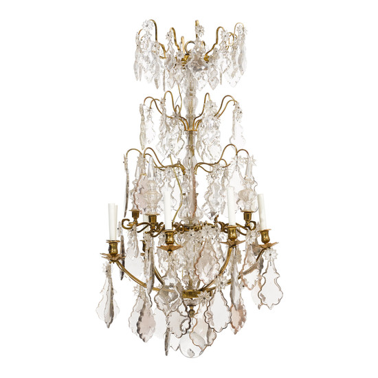A Louis XV Style Bronze and Glass Eight Light Chandelier