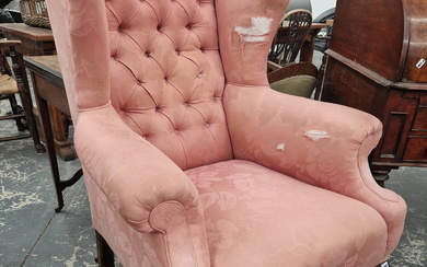 A MAHOGANY WING BACK ARMCHAIR BUTTON UPHOLSTERED IN PINK