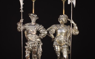 A Pair of Silver Patinated Spelter Figural Side Lamps in the form of Italian Renaissance Guards stan
