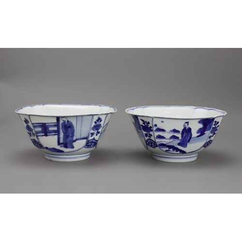 A Pair of blue and white Bowls with figures, Kangxi mark and...