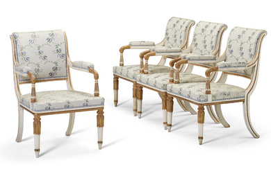 A SET OF FOUR GEORGE III CREAM-PAINTED AND PARCEL-GILT ARMCHAIRS...
