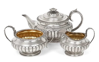 A Three-Piece George IV and William IV Silver Tea-Service The Teapot by Charles Fox, London, 1825, The Cream-Jug and Sugar-Bowl by Robert Hennell, London, 1828 and 1831