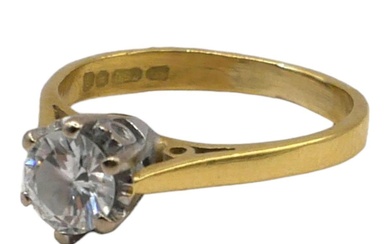 A VINTAGE 18CT GOLD AND DIAMOND SOLITAIRE RING Brilliant...