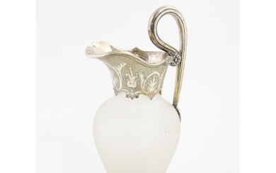 A Victorian frosted glass jug of ewer form with silver plate...