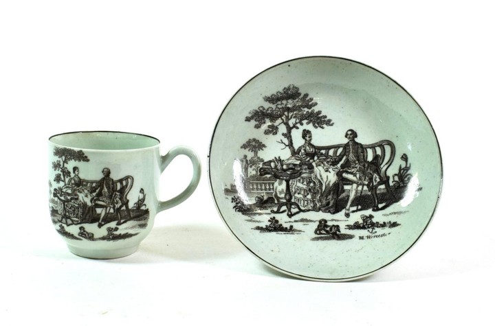 A Worcester Porcelain Coffee Cup and Saucer, circa 1760, printed...