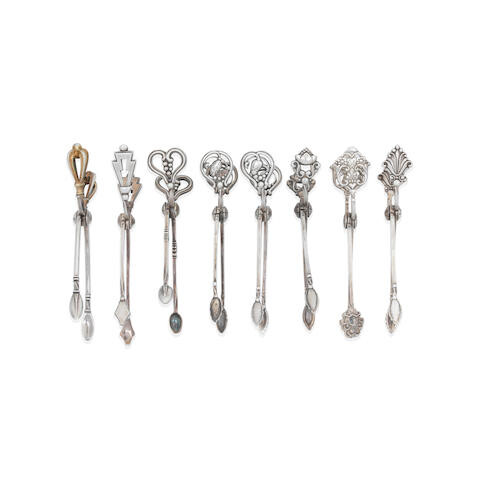 A collection of six Georg Jensen silver sugar tongs